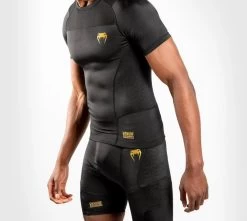 VENUM G-FIT RASHGUARD S/S BK/GD -Boxing Shop s335907598948138341 p1427 i3 w1123